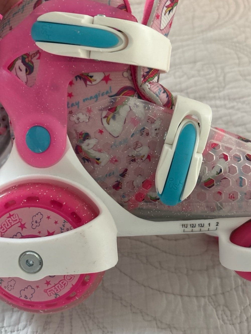 Girls Pink Unicorn Adjustable Roller Skates with Blue Accents